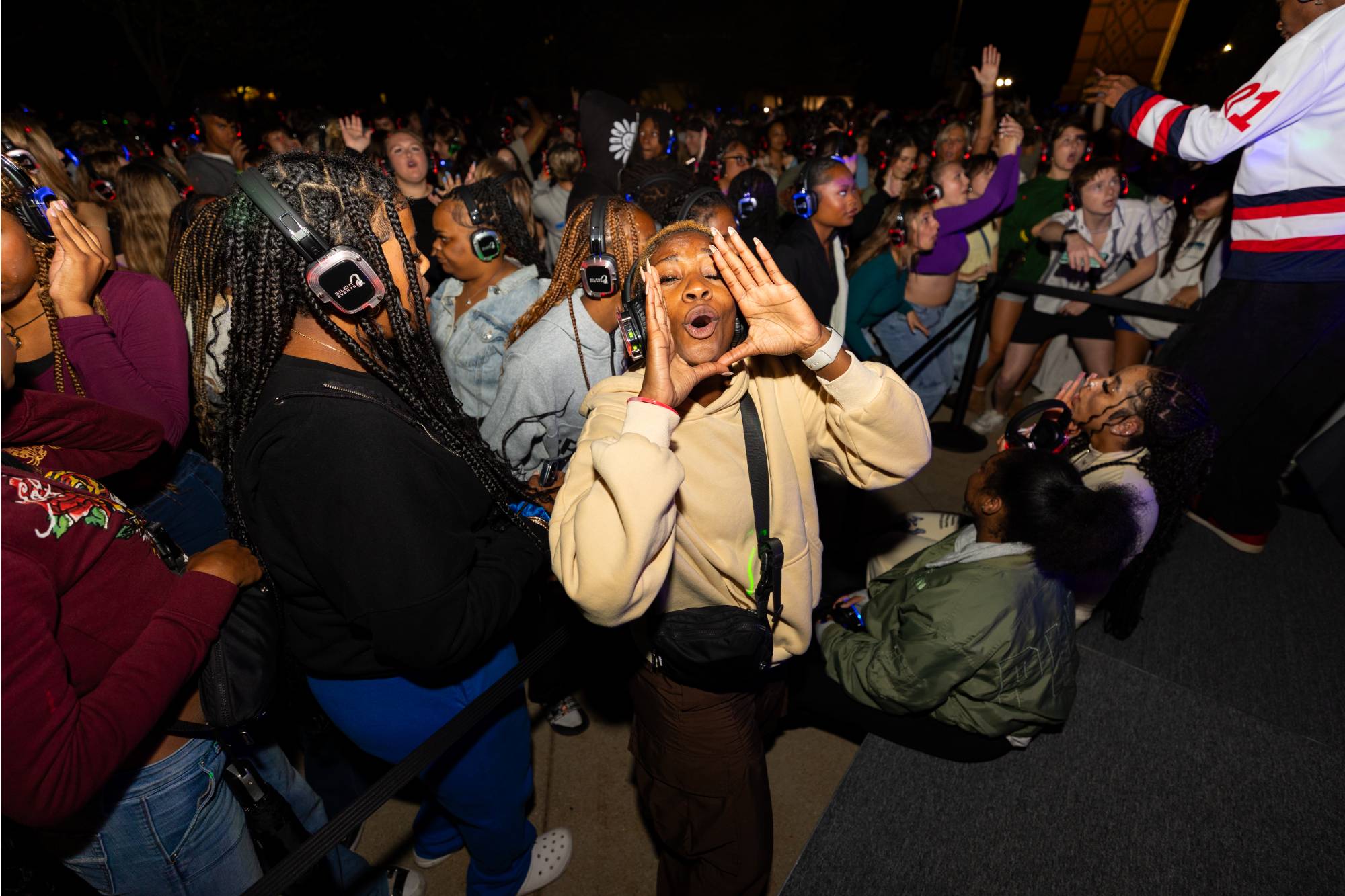 Student cheering at Silent Disco